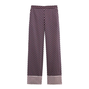 Loose high-waist wide-leg trousers with geometric diamond print and contrast hem