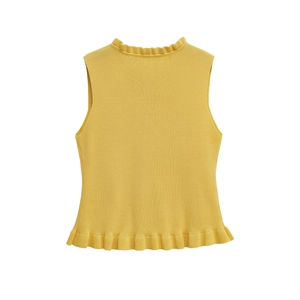 Detail of ginger yellow sleeveless knit top with elegant ruffled crew neck and hem