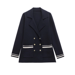 Women's double-breasted navy knit blazer with gold buttons and white stripe accents
