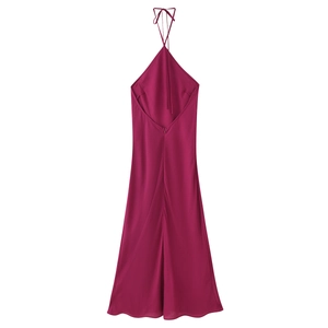 Elegante abito lungo fucsia con allacciatura al collo e schiena scoperta per l'estate