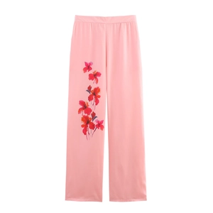 Pantalon large élégant en satin rose avec un imprimé floral délicat pour femmes