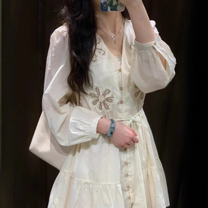 Ivory long sleeve v-neck dress with floral embroidery and adjustable drawstring waist