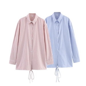 Detail of striped shirt showing classic collar, button-up front and drawstring hem