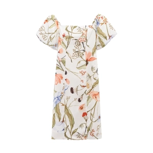 Detailed view of the square neck design and puff sleeves on a floral print summer dress