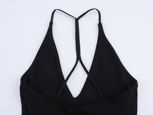 Detail of black halter neck design with V-neckline and Y-shaped strap structure