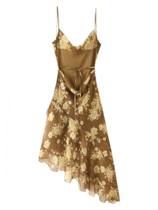 Detail of floral chiffon dress showing the elegant cowl neck and delicate ruffle trim