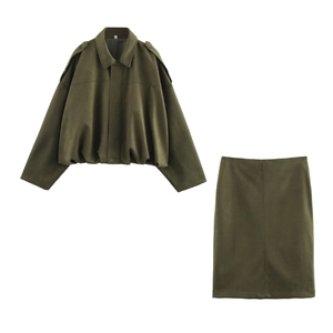 Detail of army green utility set with cropped jacket and midi pencil skirt in suede texture