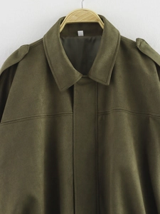 Detail of olive green faux suede pilot jacket featuring epaulettes and a classic collar