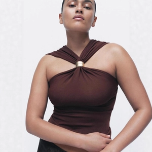 Brown halter neck knit top with metallic gold buckle detail for a slim fit summer style