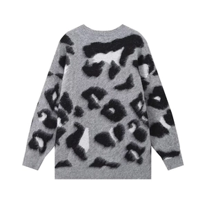 Women's trendy grey and black leopard print knit sweater with fluffy crewneck design