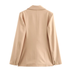 Back view of beige slim fit women blazer with gold buttons and professional tailoring