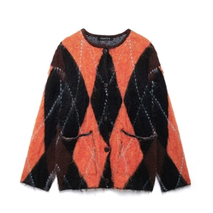 Women's crew neck argyle knit cardigan in orange and black with soft mohair texture