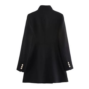 Rear view of black structured coat with gold button cuffs and tailored waistline detailing