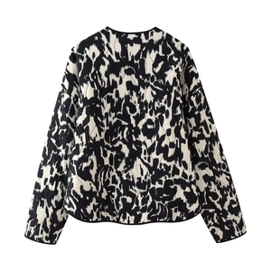 Flat lay back view of women's quilted jacket with black and white abstract animal print