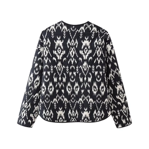 Detailed back view of a quilted long-sleeve jacket with ethnic abstract pattern