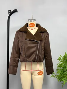Detail of dark brown faux suede cropped jacket with plush shearling collar and zipper