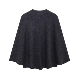 Detailed texture of charcoal grey knit cloak with ribbed crewneck and smooth wool finish