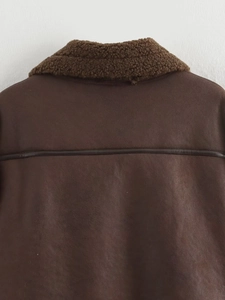 Detailed back view of a brown faux suede jacket with shearling collar and leather trim
