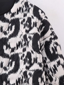 Detail shot of the diamond-quilted leopard print jacket with high-quality stitching