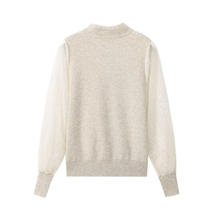 Back view of cream knit sweater with white lace puff sleeves and ribbed cuffs details