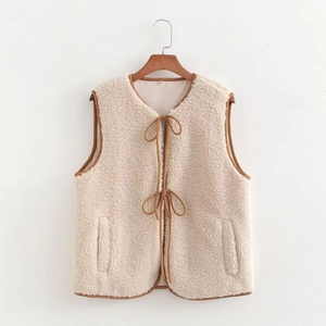 Women's cream white fleece sherpa vest with brown contrast binding and front ties