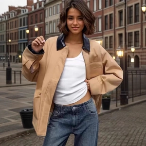 Women's autumn tan suede jacket with black leather collar and contrast pockets