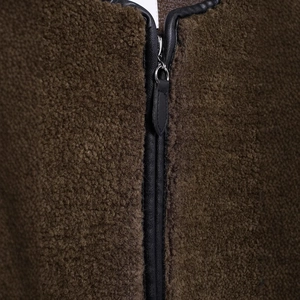 Brown fleece jacket with premium black leather trim and smooth metal zipper closure
