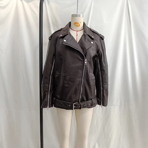 Women's black faux leather motorcycle jacket with slanted zipper and adjustable waist belt