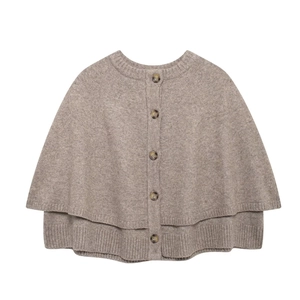 Coffee knit poncho jacket for women featuring a round neck and double-layered hem design