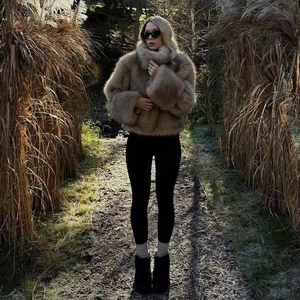 Chic tan faux fur cropped jacket for women featuring a fluffy texture and stylish streetwear design