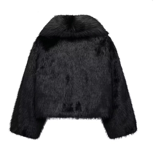 Detail view showing the dense texture and fluffy back of a black faux fur jacket