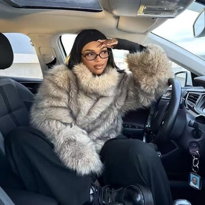 Luxurious shaggy faux fur coat in taupe mottled effect with oversized collar and wide cuffs