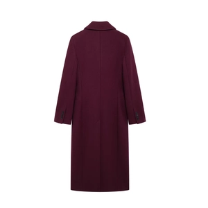 Detail view of burgundy long wool coat back featuring center seam and slit hem