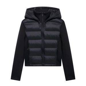 Women's black quilted hooded jacket with softshell sleeves for autumn street fashion