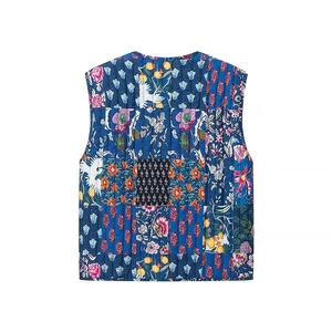 Detailed vertical quilting and intricate paisley floral print on sleeveless ethnic vest