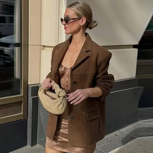 Women's brown longline blazer with champagne satin lace dress and woven handbag