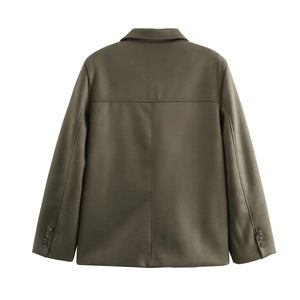 Detailed back view of a dark olive green jacket featuring structured seams and buttoned cuffs