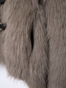 Deep grey faux fur jacket with black leather strap and gold metal rivet details