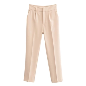 Detail of high waisted straight leg trousers in beige with pleats and side pockets