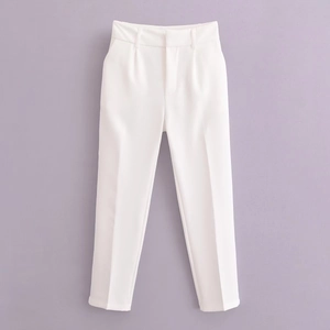 High-waist white suit trousers with pleated detail and straight leg for women