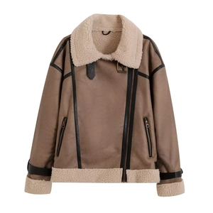 Close-up detail of vintage brown suede jacket with faux shearling lining and zipper trim