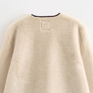 Chic beige faux fur coat with round neck and dark brown piping detail back view
