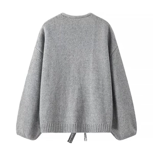 Back view of gray knit cardigan featuring drop shoulder sleeves and ribbed hem details