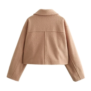 Back view of camel wool short jacket with turn-down collar and vertical seam detail