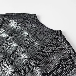 Women's crew neck metallic silver cable knit sweater with a shimmering finish