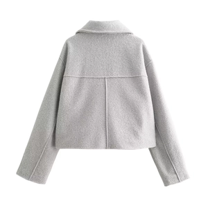 Rear view of light gray wool blend jacket showing lapel collar and seam stitching