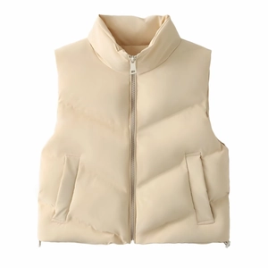 Women's cream puffer vest with stand collar, zip-up front and adjustable drawstring hem