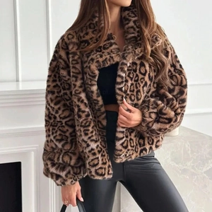 Close-up of leopard print faux fur texture and large lapel design on short jacket