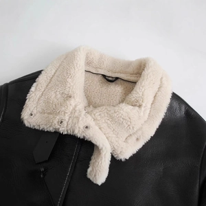Women's black faux leather shearling jacket with cream fleece collar and metallic buttons