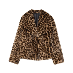 Detail shot of the plush faux fur texture and leopard print pattern on a stylish coat